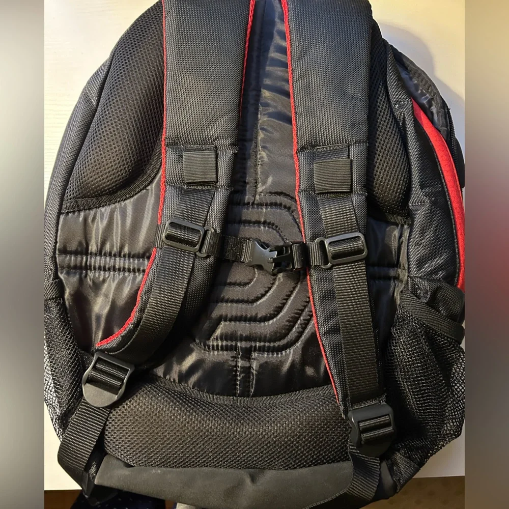 NWOT red and black padded backpack